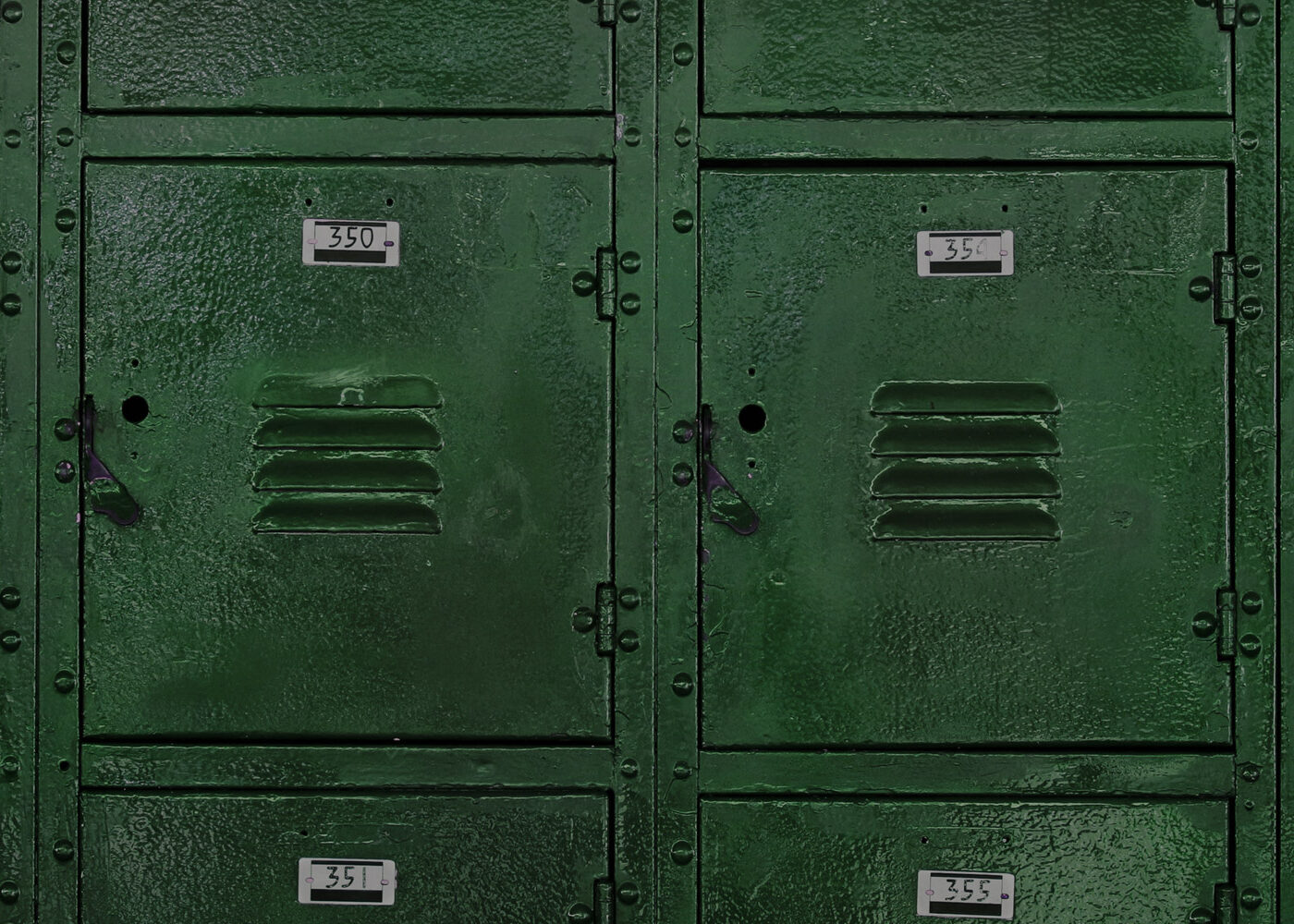 Several green metal lockers
